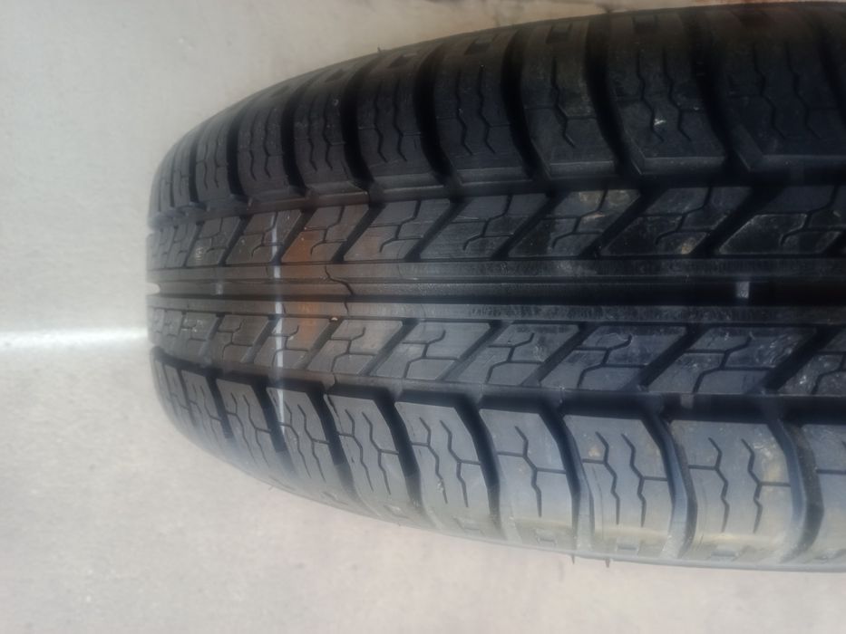 Продам шину с диском на Опель