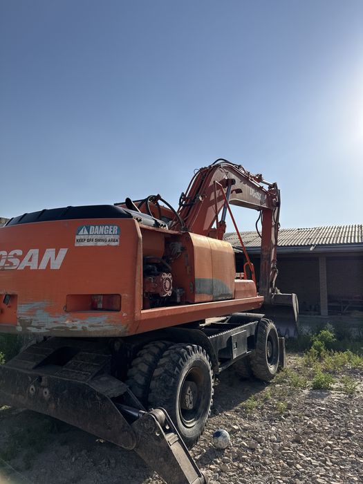 Dossan 210 экскаватор