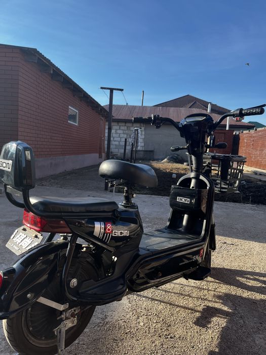 Электроный скутер