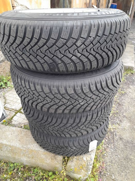 Продава оригинални алуминиеви джанти с гуми,BMW,15 цола