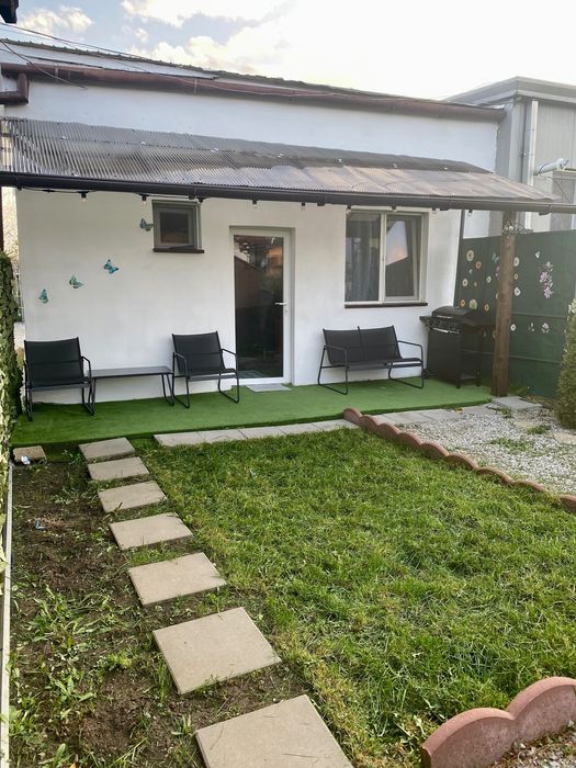 Apartament cu grădină, de închiriat pentru perioade scurte