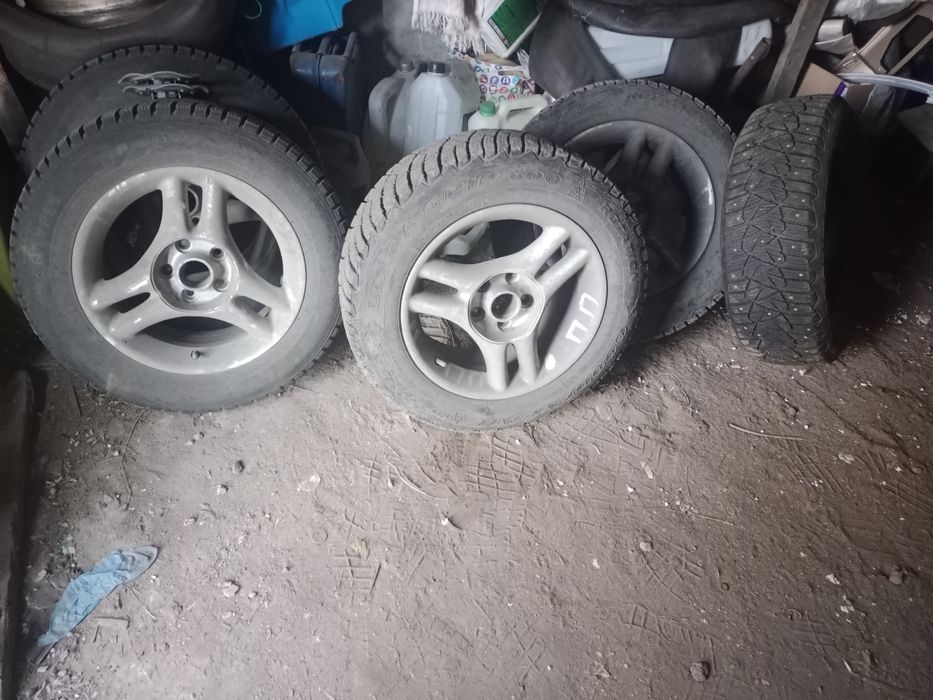 Зимние калеса с дисками  Волгу