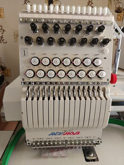 Mașina de brodat cu comanda program