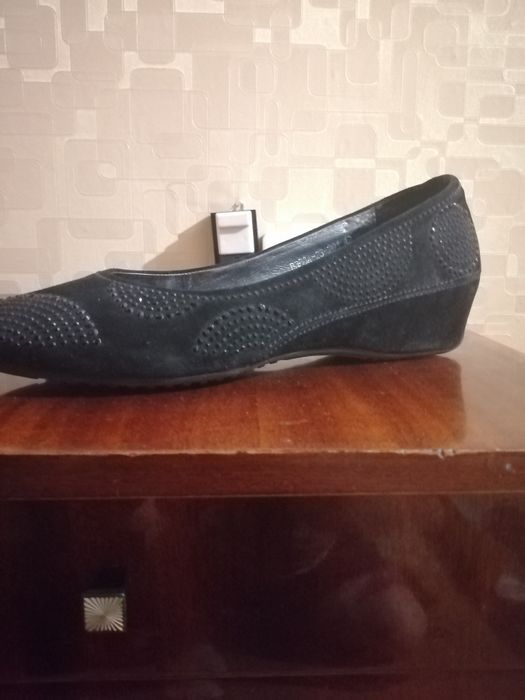 Продам новые женские сапоги