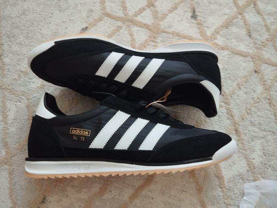 Продам Adidas SL72