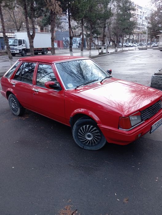 Мазда 323 фамилия