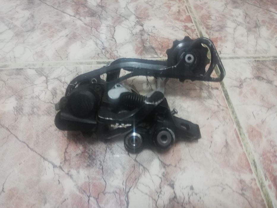 Vând schimbător pinioane shimano XT shadow