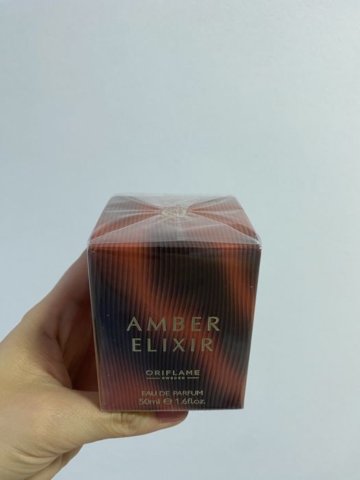 Apa de parfum Amber Elixir