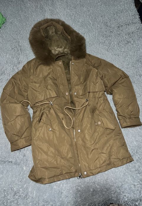 Продам куртку новую