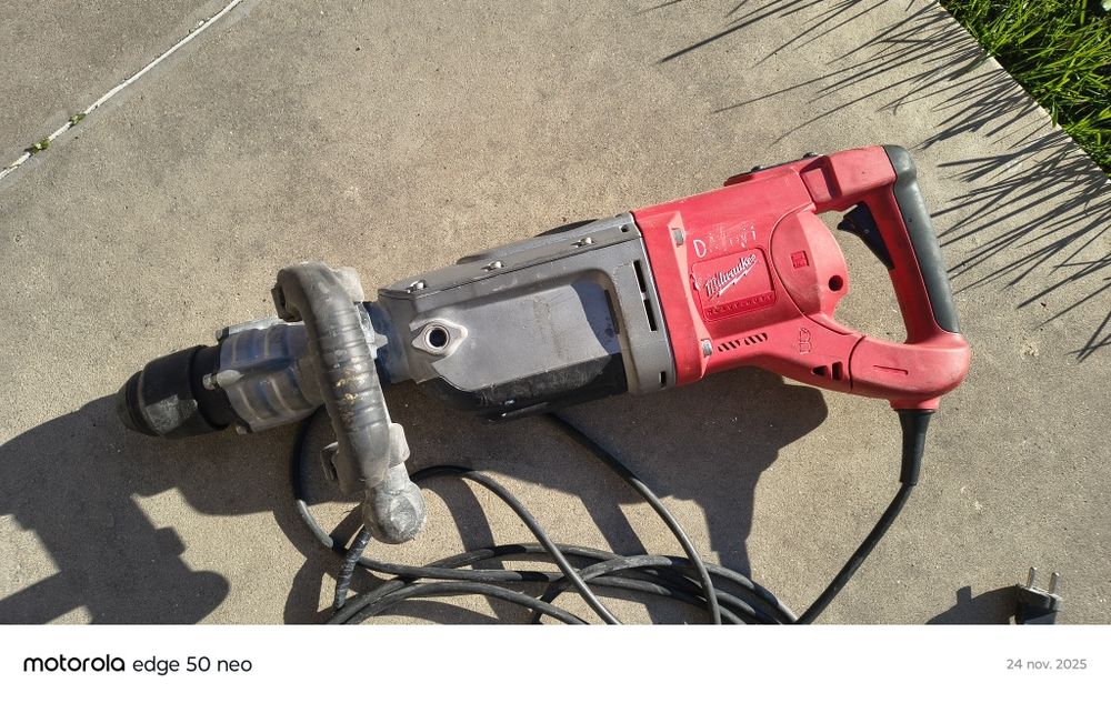 Drujba Dolmar și foarfeca benzina Stihl de tuns gard viu