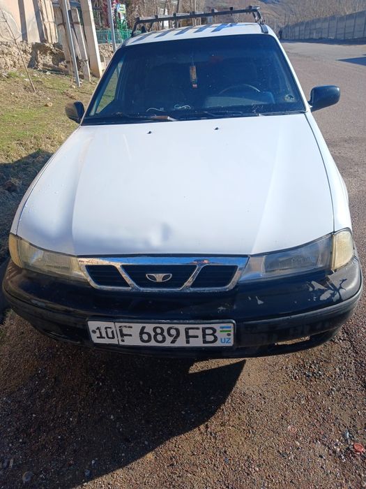 Нексия 1 сотилади яхши холатда ок ранг 2004 йил