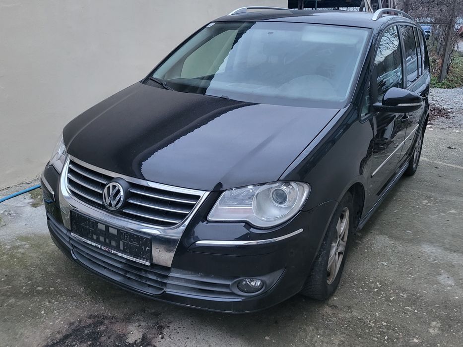 Touran 7 locuri Anul 2010 1.9 tdi 105cp 6 viteze Carlig Jante