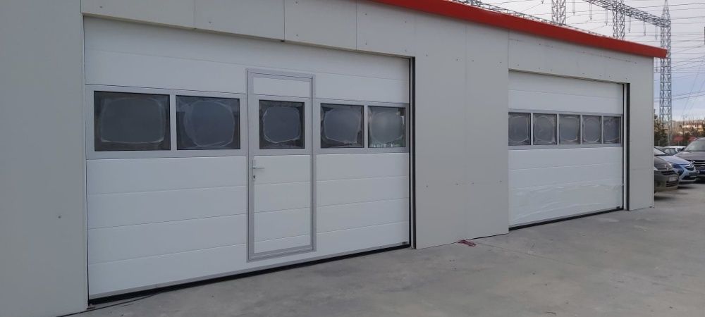 Usa de garaj sectionala izolata 2500L/2000H + automatizare cu 2 telec.