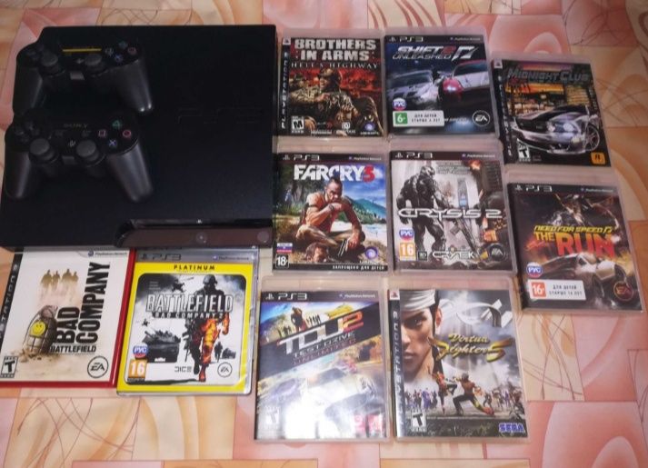 Не прошитая пс3 с дисками.