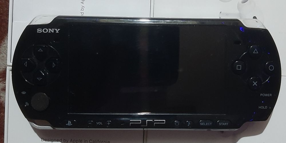 Vand psp în stare bună 3003 cu god of war
