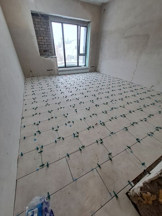 Укладка ламината, кафель ,керамогранит.