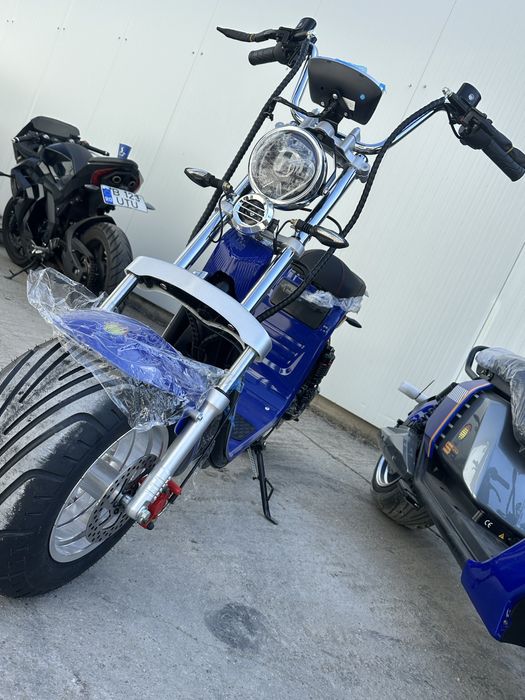scuter electric model cu cartelă 2026
