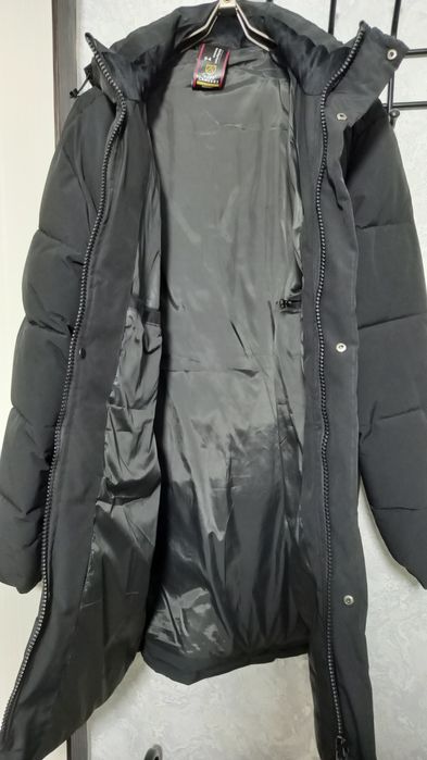 Пуховик новый 54 размер