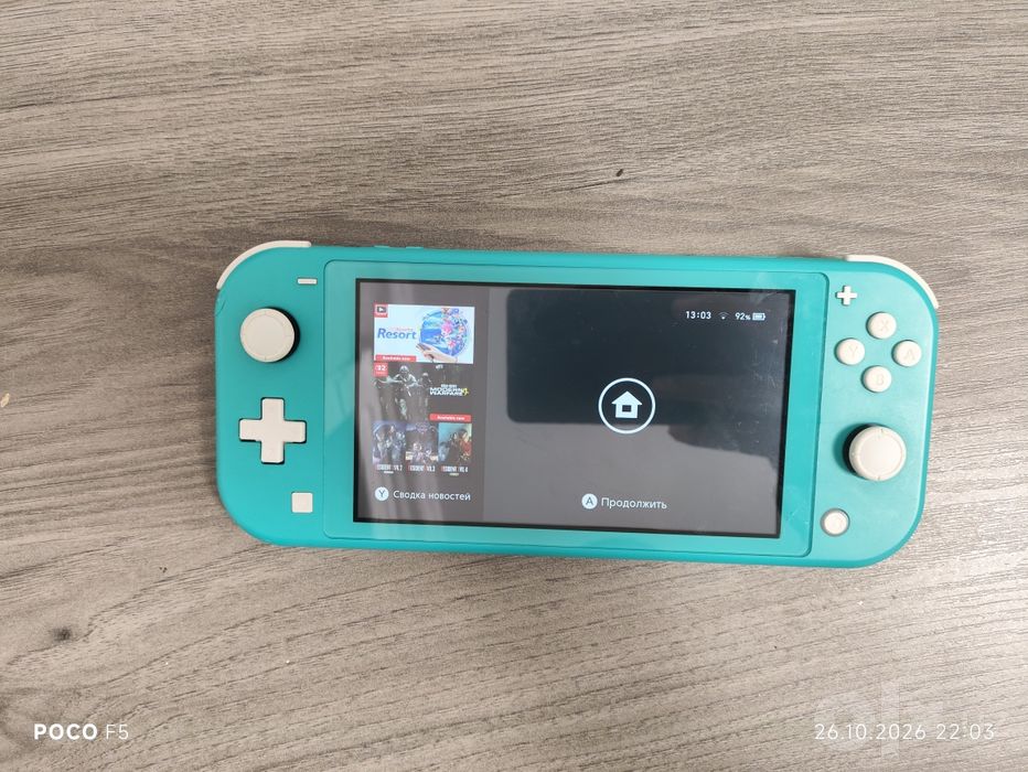 Nintendo Switch Lite (Turkuaz) holati yaxshi