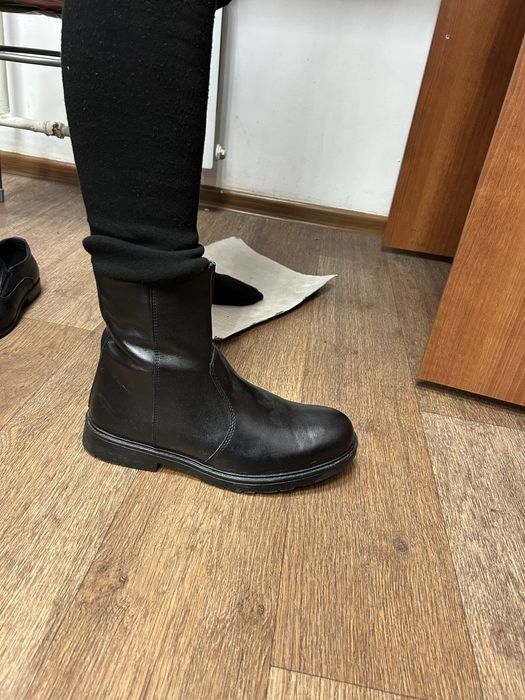 Продам новые мужские сапоги