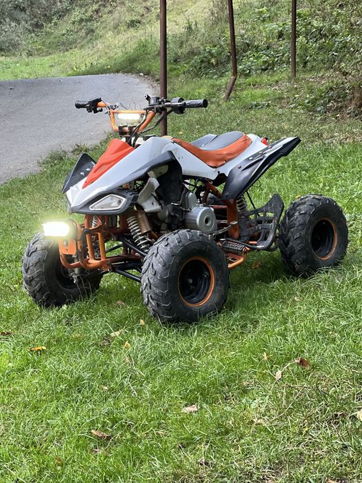 Vând atv de copii de 125 cm automat merge bine trage bine