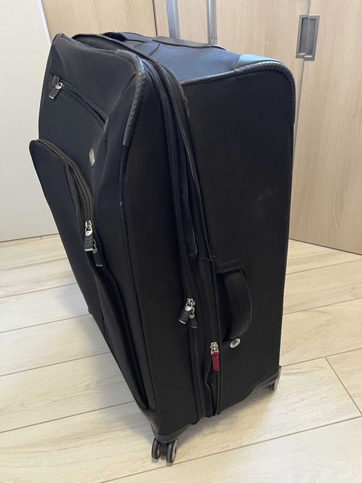 Куфар Samsonite, голям, ползван, колелцата работят префектно