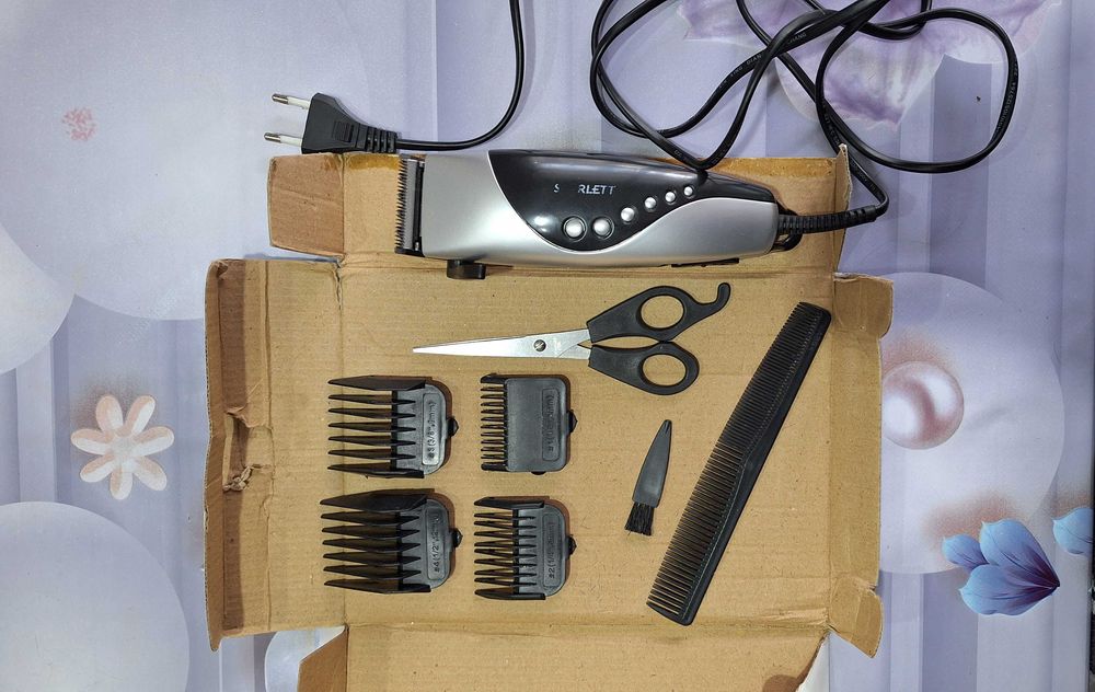Машинка для стрижки волос.