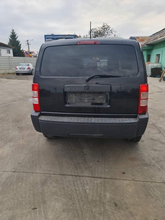 Dezmembrez dodge nitro 2.8  automat si manual