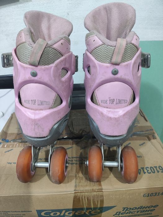 Розовые ролики детские