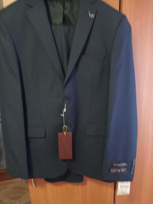 Продам костюм 48 размер