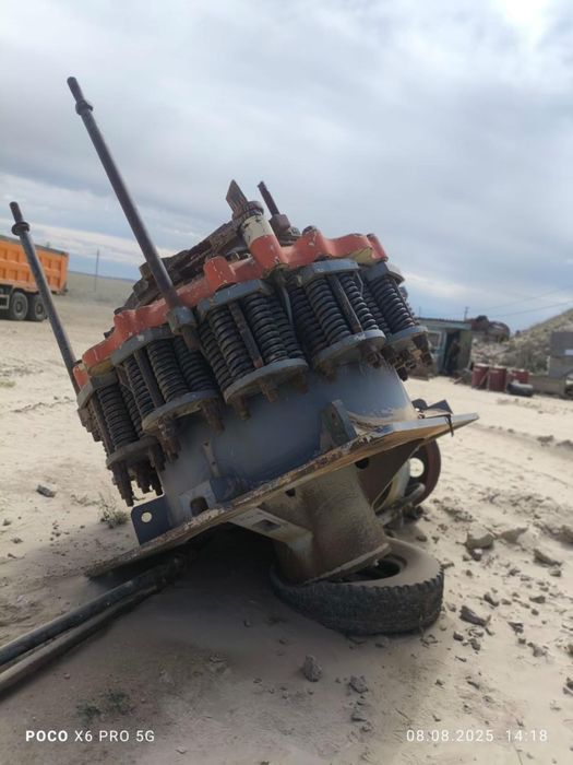 Конусная дробилка