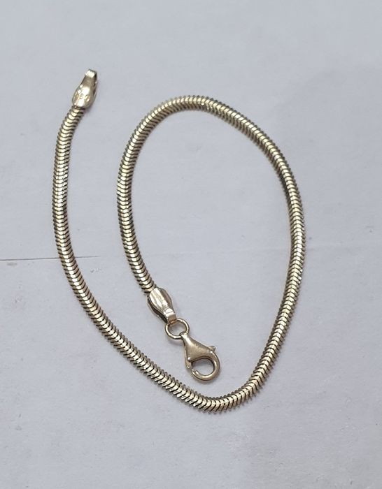 Браслет    бренд  змейка.