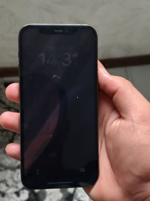 iphone 12 pro holati yaxshi faqat kamera  batarya almashgan arginaliga