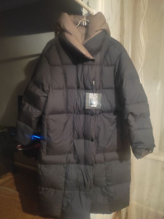 Продам новый двусторонний пуховик .