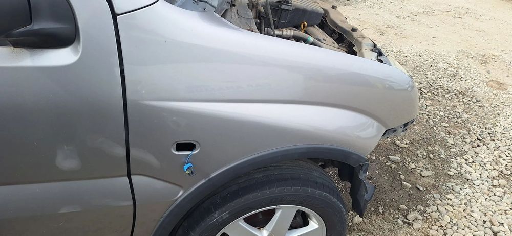 aripa fata dreapta suzuki ignis an 2004-2006