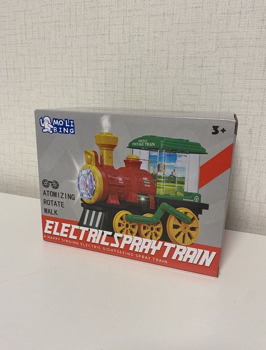 Музикален локомотив с пушек, светлини и въртящи се картинки, влакче