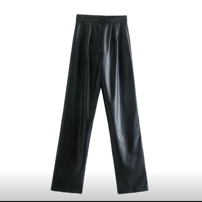 Новый брюки из экокожы.