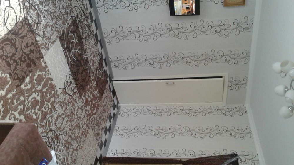 Коттедж зади ЦУМа