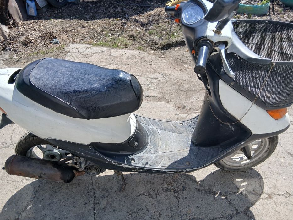 Продам скутер хонда находится в Карабулаке