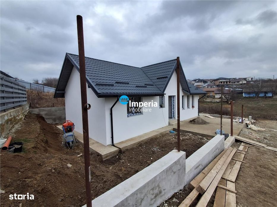 Casa plan parter de vanzare in zona Bucium Visan