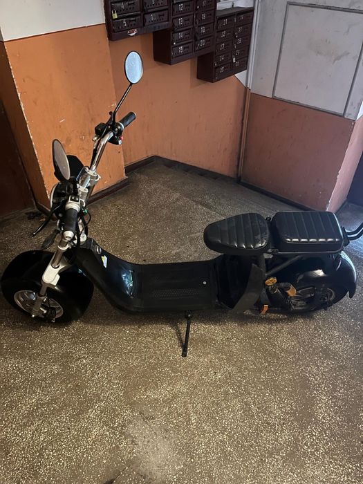 Scuter electric moped