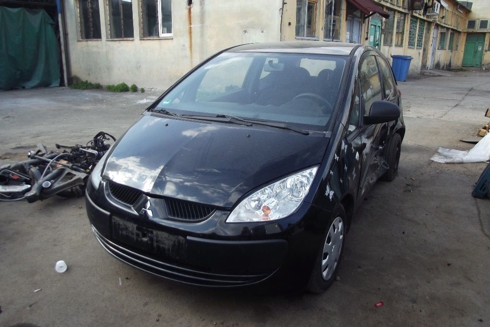 Dezmembrez Mitsubishi Colt motor 1.3 cutie manuala caseta usa bara