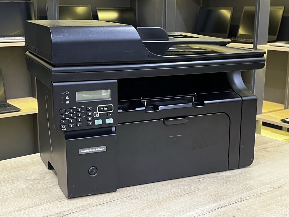 Офисное лазерное МФУ HP LaserJet M1212nf MFP, черно-белая печать, А4