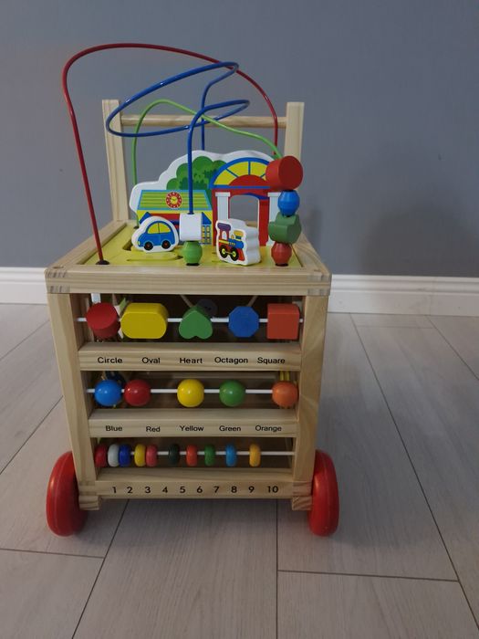 Antemergator Educational si Interactiv 6 in 1 Clock Walker Indiggo®, din Lemn