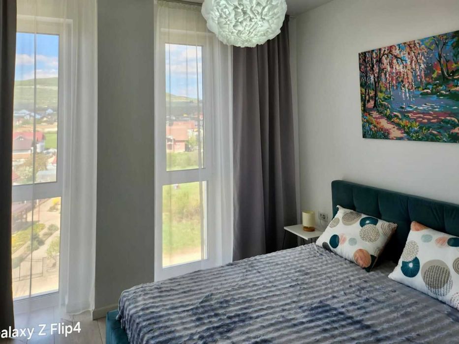 Închiriez apartament 2 camere, modern, parcare subterană, bloc nou – 52 mp