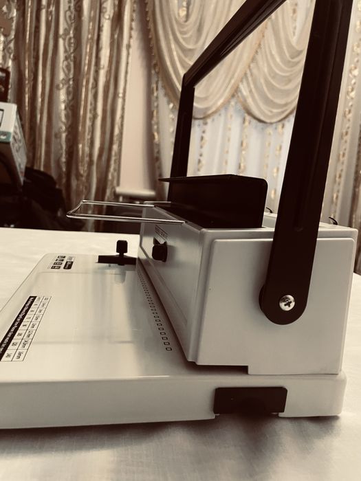 Переплетная машина на металлическую пружину