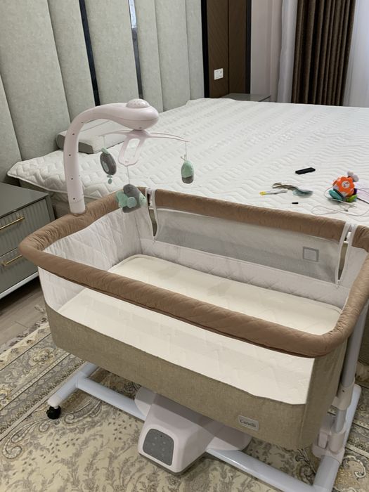 детская кроватка качалка