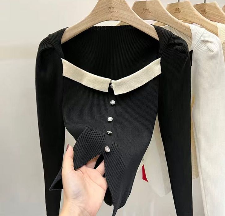 Женский свитер с пышными рукавами