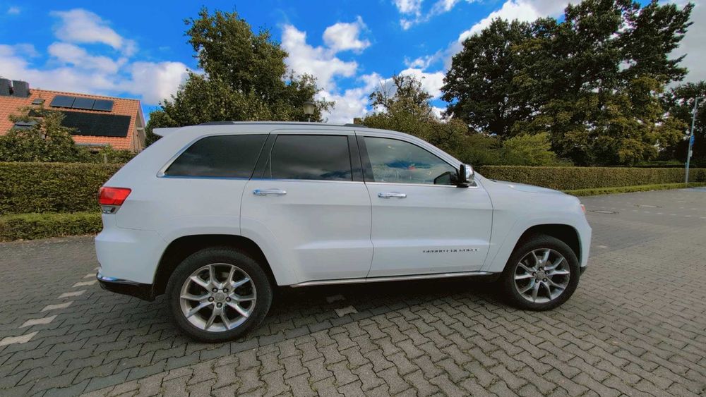 Vând Jeep Grand Cheroke summit 2014