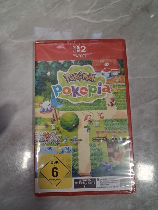 Pokemon  joc nou sigilat in folie livrare se face  prin fan curier
